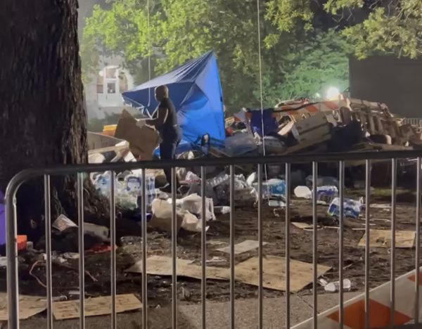 Encampment demolished, 14 arrested