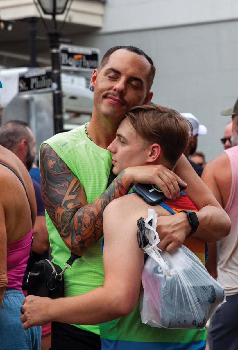 Sabrina Laurence and their partner outside a bar on Bourbon Street.