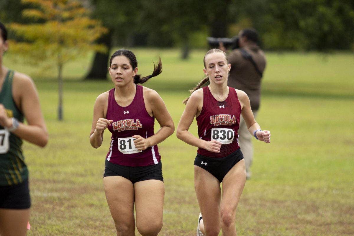 Wolf Pack Cross Country runners Madison Leishman (left) and Emma Meneses (right) compete in the Battle For New Orleans on Aug. 30. Courtesy of Loyola University New Orleans Athletics