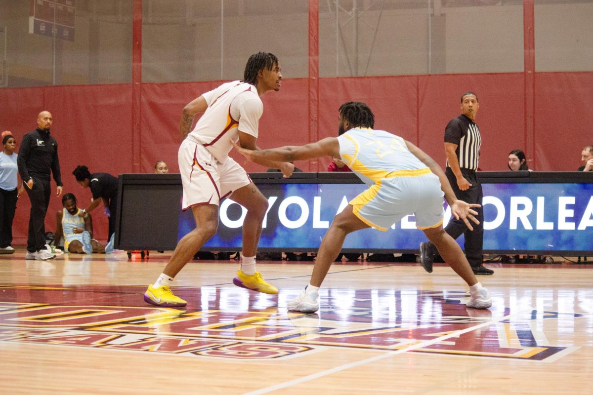 Junior guard Alex Hammond dribbles the ball against Southern University of New Orleans in the Den on Oct. 24, 2024. Hammond led the team in scoring on the night with 17 points. 