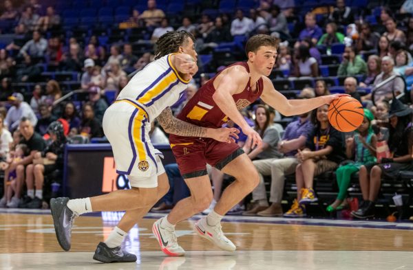 Graduate Student Milan Mejia dribbles the ball against LSU in an exhibition match in Baton Rouge, La. on Oct. 29, 2024. Photo courtesy of Payton Prichard.