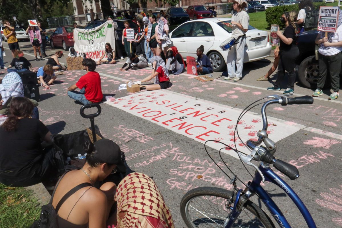 Pro-Palestinian protesters gather on St. Charles Avenue outside Loyola University on Oct. 7, 2024. This rally was held on the one year anniversary of the Israel-Hamas war resurgence.
