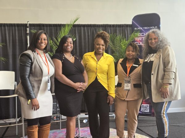 Attendees stand at Black Tech Nola conference.