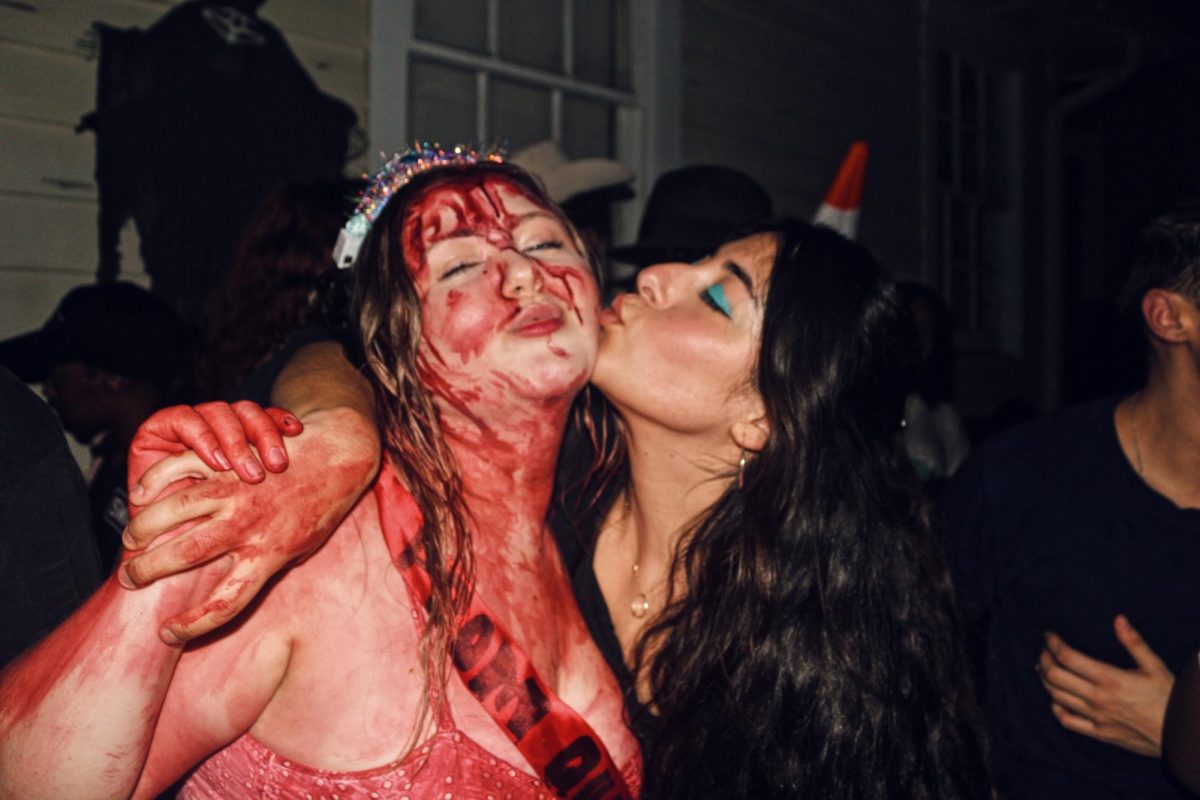 Abby Robbins and Isabella Soria-Gilman dressed as Carrie and Amy Winehouse enjoying each others company for Halloween.