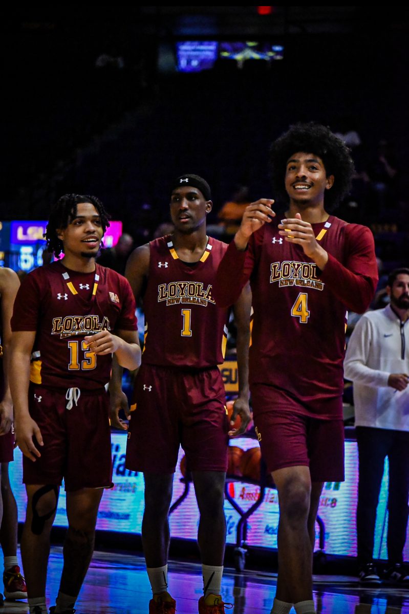 (L to R) Kameron Johnson, Leonard Jackson III, and Cameron Williams walk on to the court to play Louisiana State University in Baton Rouge, La. on Oct. 29, 2024.