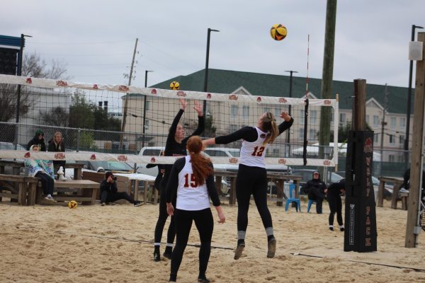 Preslie Boswell prepares to spike the ball. The beach volleyball team had a 9-14 record last season.