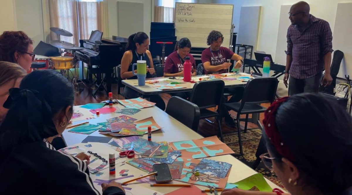 Non-profit KID smART hosts Arts Experince In Classrooms workshop for artists in education. Public school teachers used collage art to invision a future levee along the Mississippi river, on April 9, 2025. Violet Bucaro/The Maroon