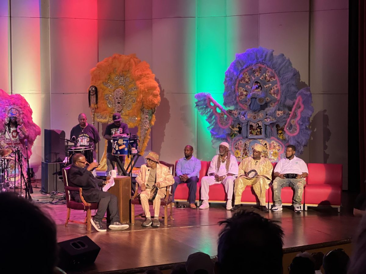 WGNO Reporter LBJ sits down and interviews the five Big Chiefs of the tribes with their tribunal costumes displayed across the stage.