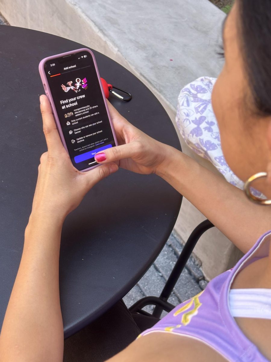 Adrianna Escobar sets up her Instagram account on the new school feature.