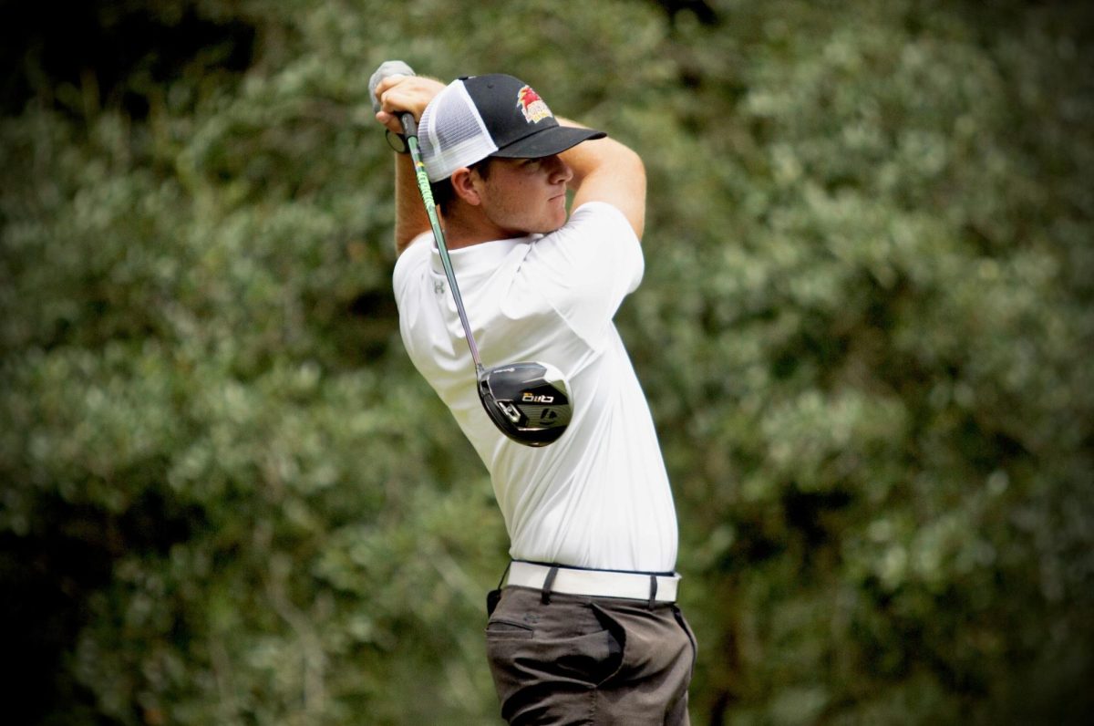 Cole Hasse competes in a golf tournament, showcasing his focus and precision on the course. Courtesy Cole Hasse
