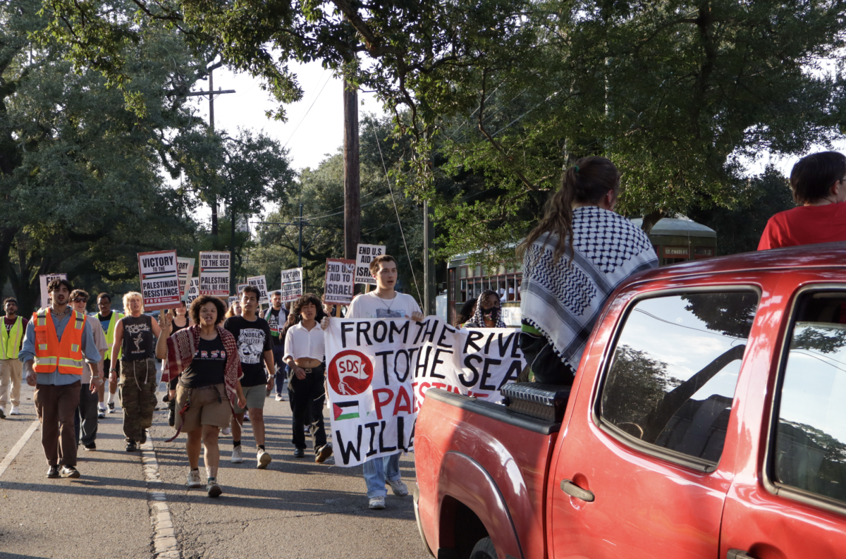 Pro-Palestine protesters begin marching down St. Charles Avenue on Sep. 18, 2024. This rally and march was to continue to call for university disclosure of funds.