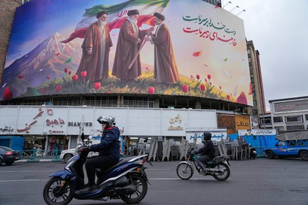Billboard depicting Iran’s late Supreme Leader Ayatollah Ali Khamenei, center, his son and successor Ayatollah Mojtaba Khamenei, right, and the late revolutionary founder Ayatollah Ruhollah Khomeini in downtown Tehran, Iran, Tuesday, March 10, 2026.