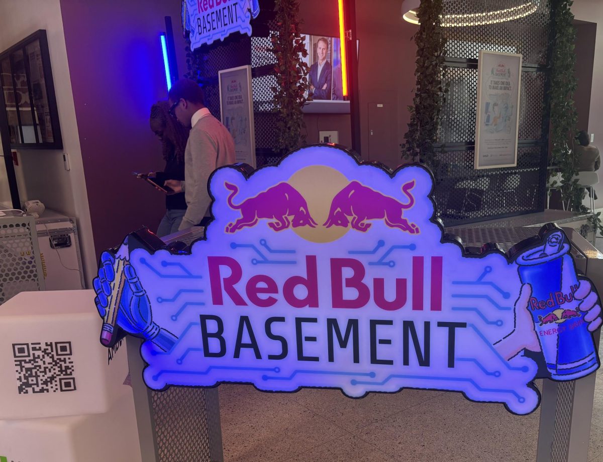 Red Bull's sign promotes Red Bull Basement at New Orleans Entrepreneurship Week. Red Bull Basement is an entrepreneurial program that collects participant ideas.