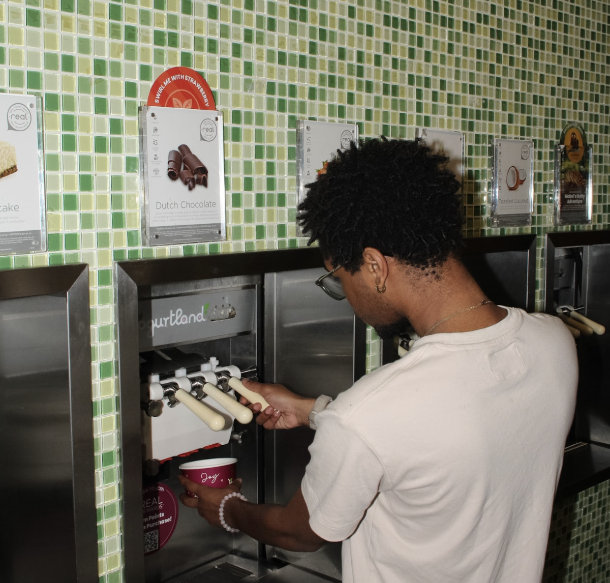 Student Joshua Fletcher gets frozen yogurt at Yogurtland. Taken on: March 10, 2026. Taken by: Pharrell Every
